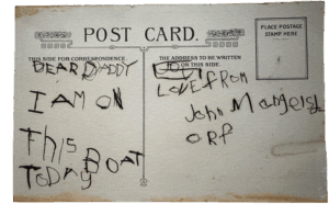 Postcard with child's early attempts at writing